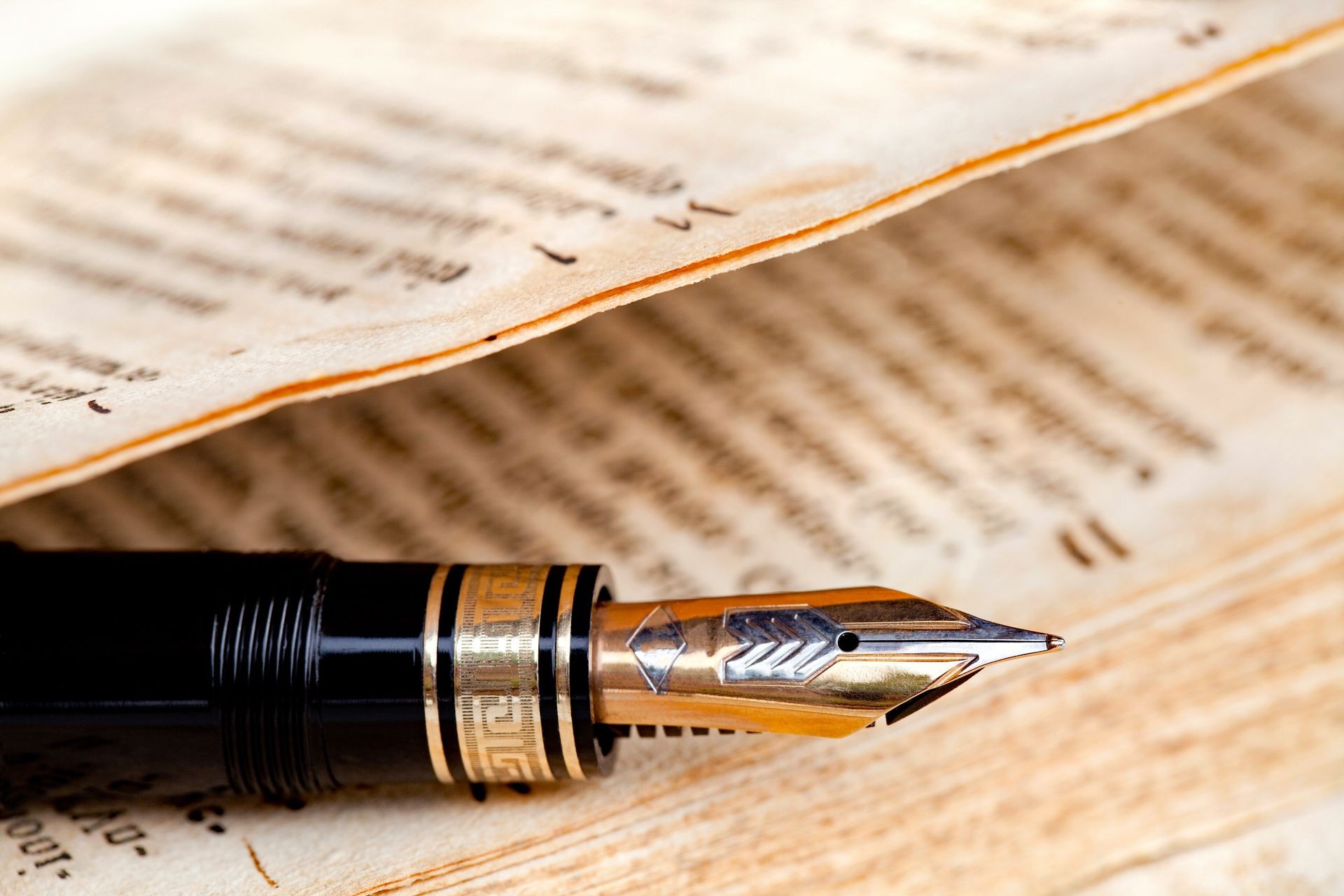 old book with fountain pen